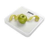 close up of scale, tape and apple on white background with clipping pa
